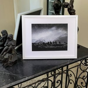 moody cloud print in frame