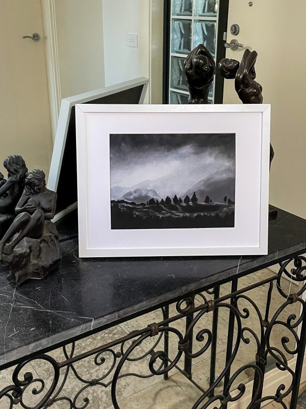 moody cloud print in frame